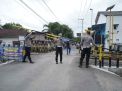 Polres Kediri Kota Pasang Palang Pintu Perlintasan Kereta untuk Cegah Kecelakaan
